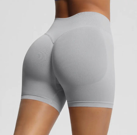 Sømløse sportsshorts for kvinner med løftende effekt